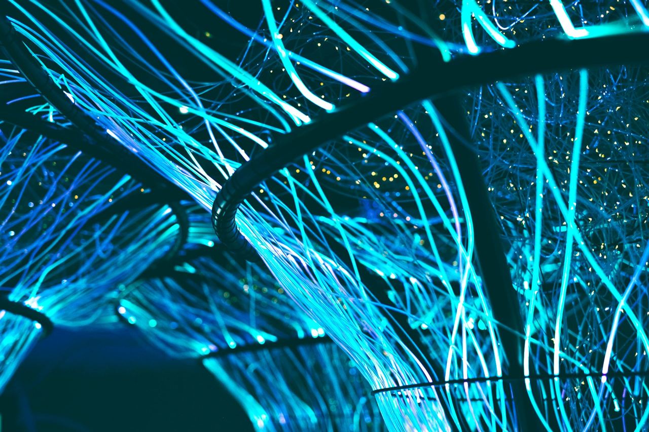Glowing blue optical fibres
