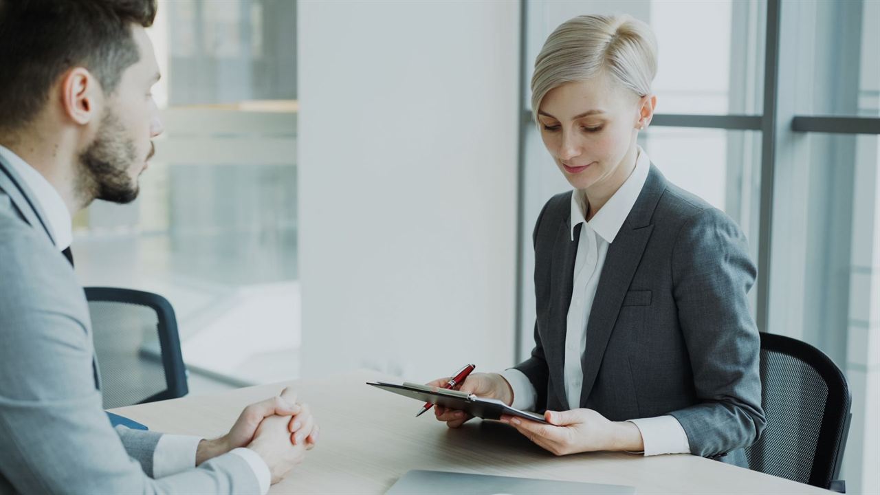 Two colleagues in a friendly business meeting